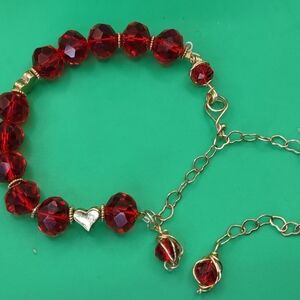 Elegant Red Beaded Bracelet with Gold Accents